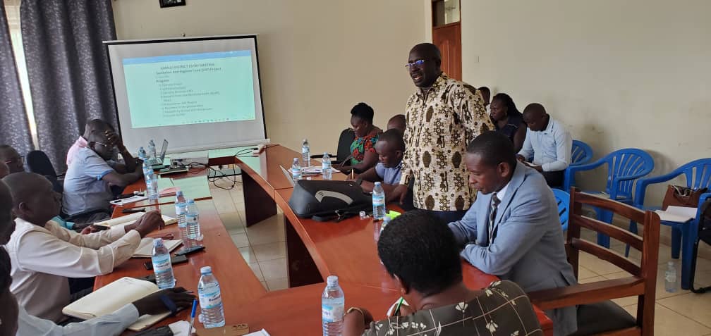 The RDC,LCV and team handing over a construction site to the contractor at Namujenjera p/s, Butansi Sub County. A 2 unit teacher's house with a 2 stance VIP latrine to be constructed at a sum of 91,077,120(VAT inclusive) by BENSA Investments LTD. Namujenjera p/s, Butansi Sub County